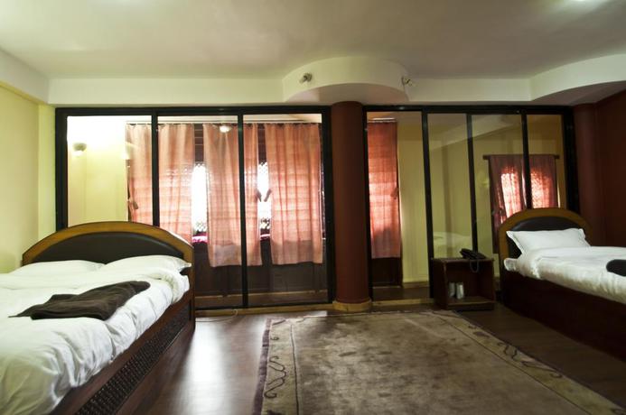 Imagen de la habitación del Hotel Siddhi Home and Restaurant. Foto 9