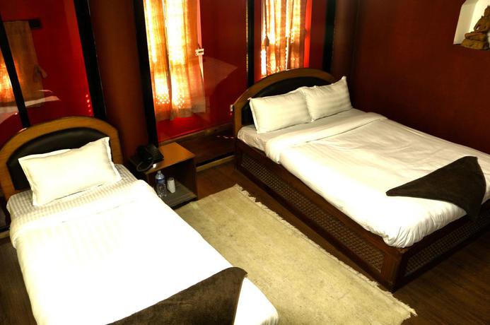 Imagen de la habitación del Hotel Siddhi Home and Restaurant. Foto 10