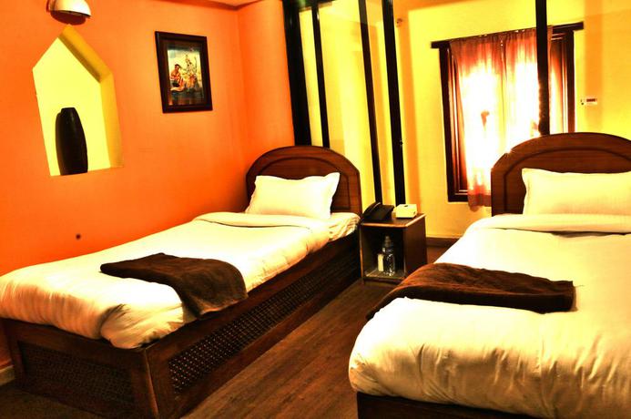 Imagen de la habitación del Hotel Siddhi Home and Restaurant. Foto 11