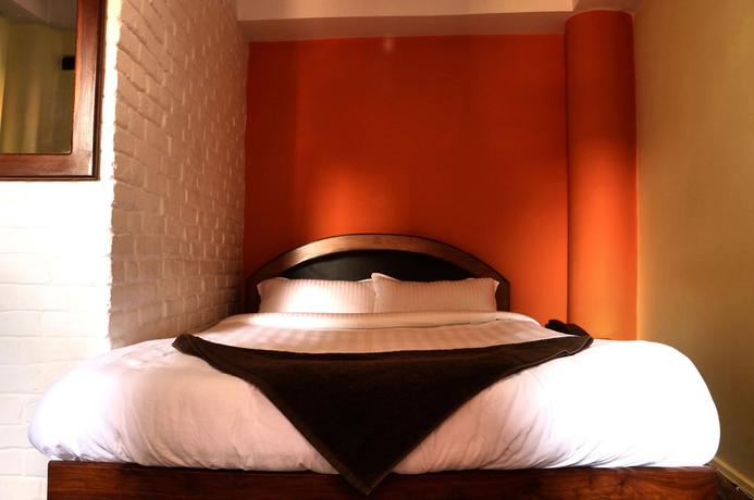 Imagen de la habitación del Hotel Siddhi Home and Restaurant. Foto 12