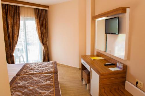 Imagen de la habitación del Hotel Side All Inclusive Park Beach. Foto 20
