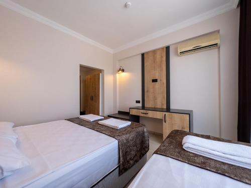 Imagen de la habitación del Hotel Side Sunset. Foto 6