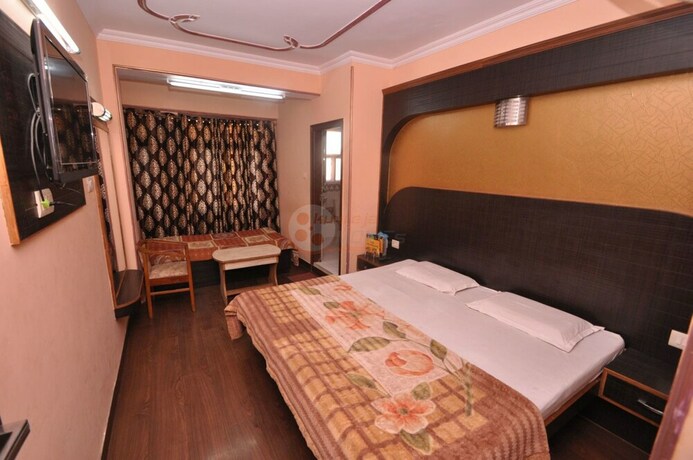 Imagen de la habitación del Hotel Sidharth Regency. Foto 17