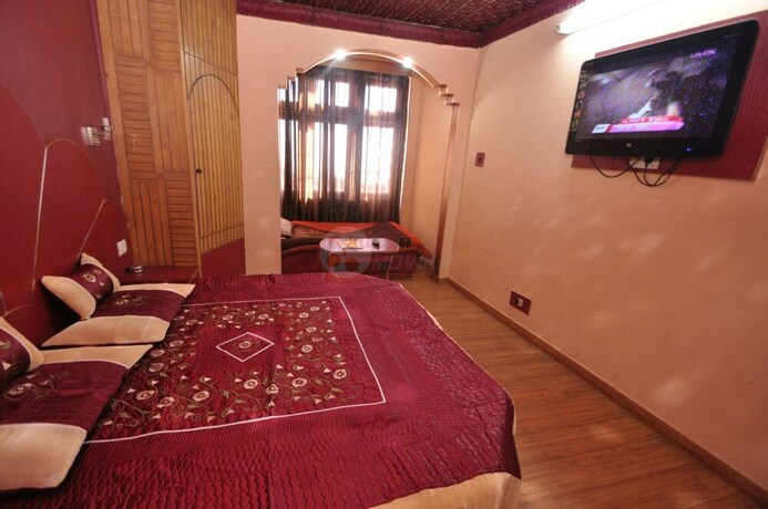 Imagen de la habitación del Hotel Sidharth Regency. Foto 21