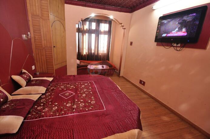 Imagen de la habitación del Hotel Sidharth Regency. Foto 27