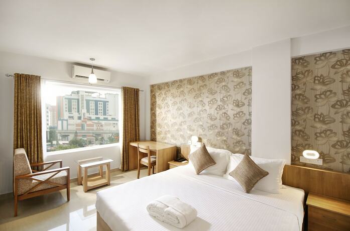 Imagen de la habitación del Hotel Sidra Pristine And Portico Halls. Foto 14