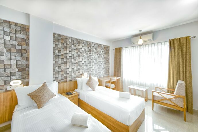 Imagen de la habitación del Hotel Sidra Pristine And Portico Halls. Foto 16