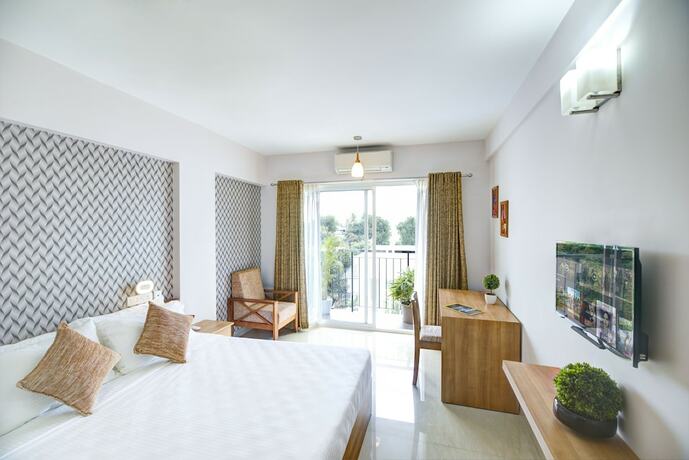 Imagen de la habitación del Hotel Sidra Pristine And Portico Halls. Foto 17