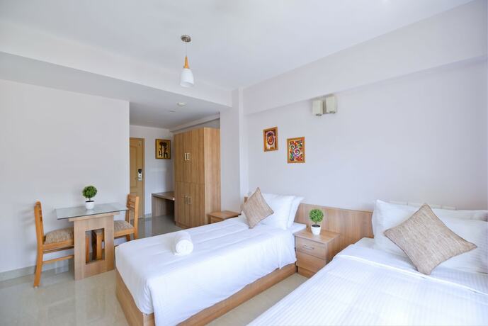 Imagen de la habitación del Hotel Sidra Pristine And Portico Halls. Foto 18