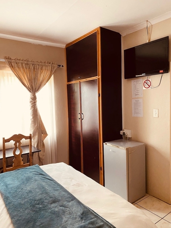 Imagen de la habitación del Hotel Sidze Guest House. Foto 7