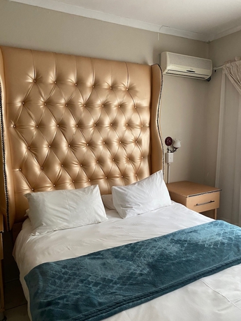 Imagen de la habitación del Hotel Sidze Guest House. Foto 8