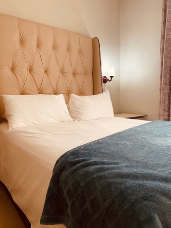 Imagen de la habitación del Hotel Sidze Guest House. Foto 14