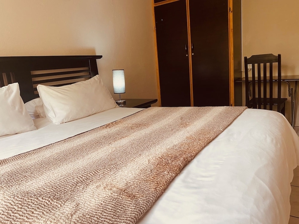 Imagen de la habitación del Hotel Sidze Guest House. Foto 15