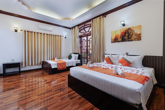 Imagen de la habitación del Hotel Siem Reap Urban Boutique. Foto 10