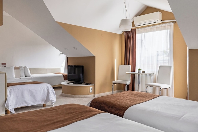 Imagen de la habitación del Hotel Sienna Residence. Foto 10