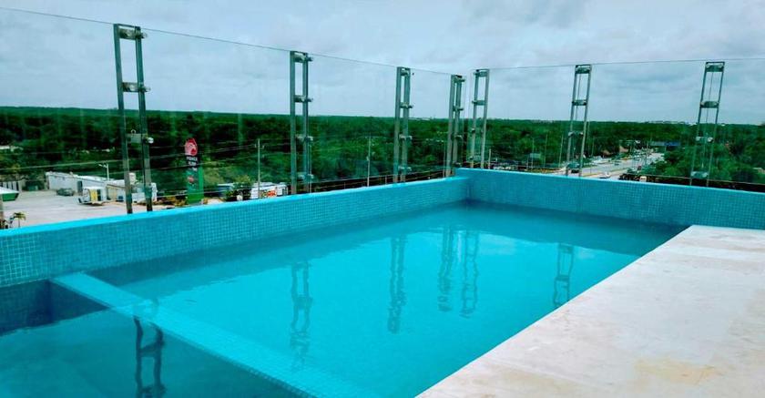 Imagen de la piscina del Hotel Siente Tulum. Foto 27
