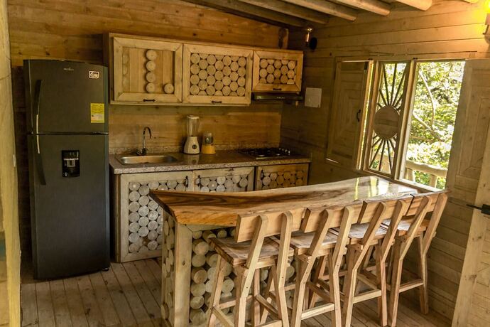 Imagen de la habitación del Hotel Sierra Lim&oacute;n Caba&ntilde;as Club. Foto 13