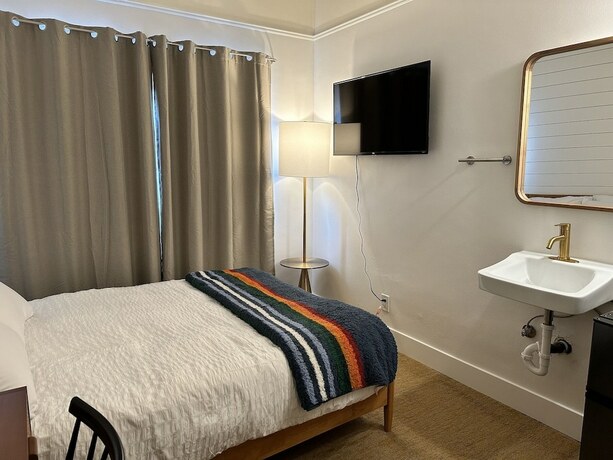 Imagen de la habitación del Hotel Sierra Motor Lodge. Foto 17