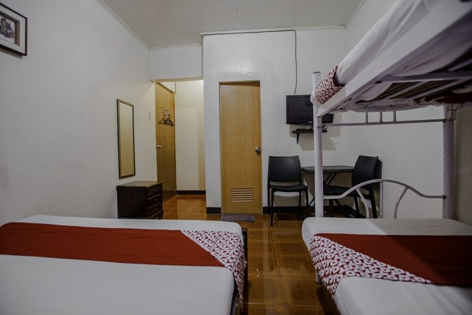 Imagen de la habitación del Hotel Sierra Traveller's Inn Holy Spirit. Foto 12
