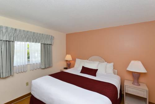 Imagen de la habitación del Hotel Siesta Beach Resort & Suites Tiki & Pool. Foto 12