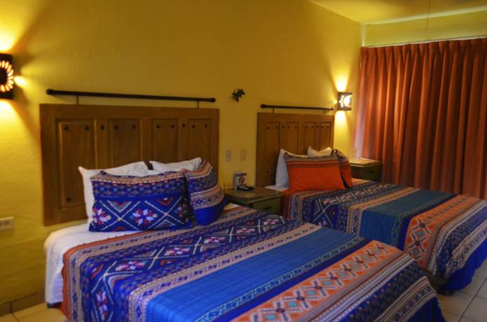 Imagen de la habitación del Hotel Siesta Suites Boutique. Foto 9