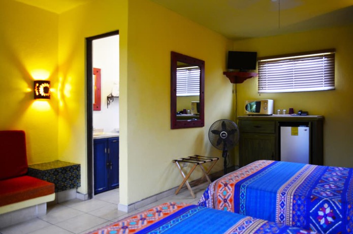 Imagen de la habitación del Hotel Siesta Suites Boutique. Foto 10