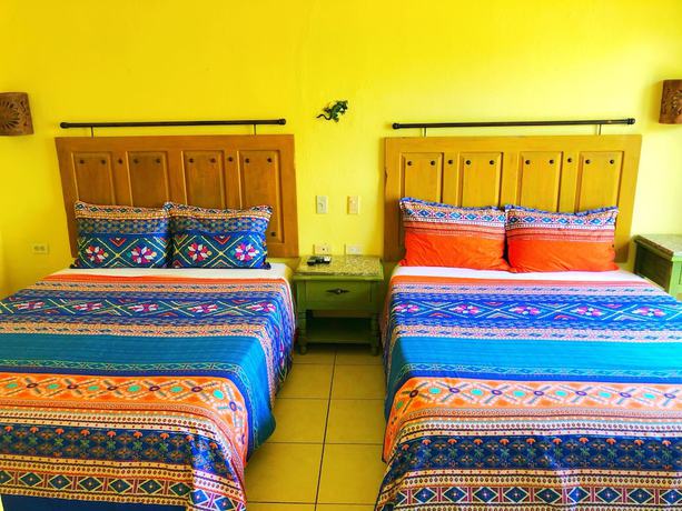 Imagen de la habitación del Hotel Siesta Suites Boutique. Foto 18