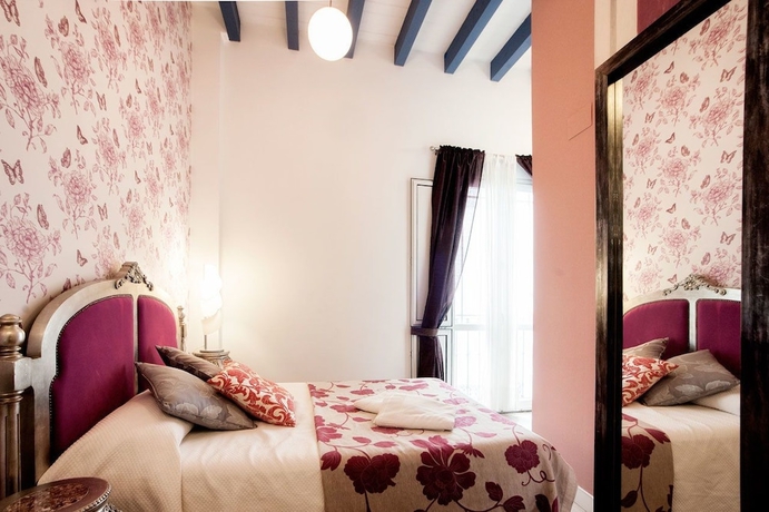 Imagen de la habitación del Hotel Siete Revueltas Singular Apartments. Foto 2