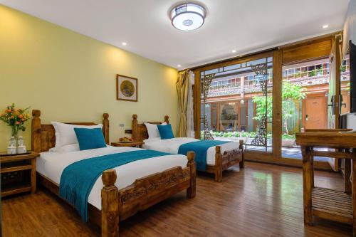 Imagen de la habitación del Hotel 思法特观景客栈 Sifat Viewing Inn. Foto 11