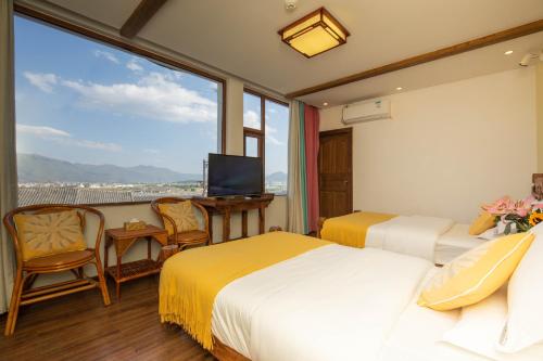 Imagen de la habitación del Hotel 思法特观景客栈 Sifat Viewing Inn. Foto 15