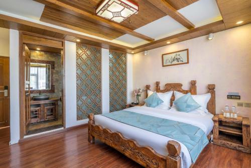 Imagen de la habitación del Hotel 思法特观景客栈 Sifat Viewing Inn. Foto 17