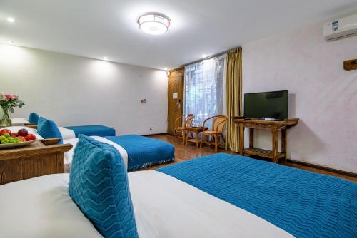 Imagen de la habitación del Hotel 思法特观景客栈 Sifat Viewing Inn. Foto 20