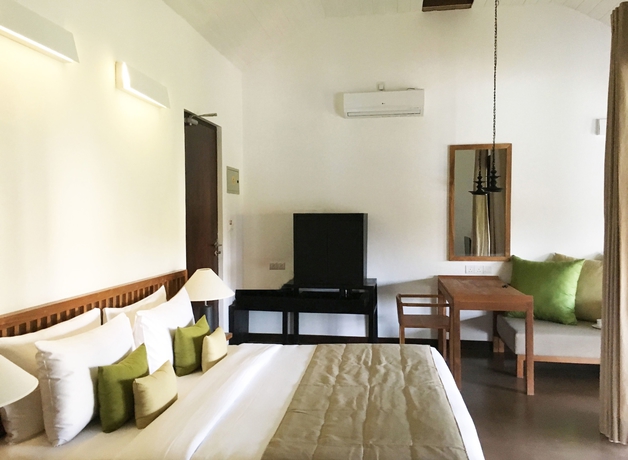 Imagen de la habitación del Hotel Sigiriya Jungles. Foto 8
