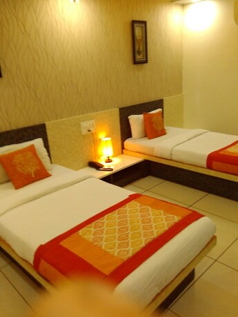 Imagen de la habitación del Hotel Sigma Inn By Sky Stays. Foto 20