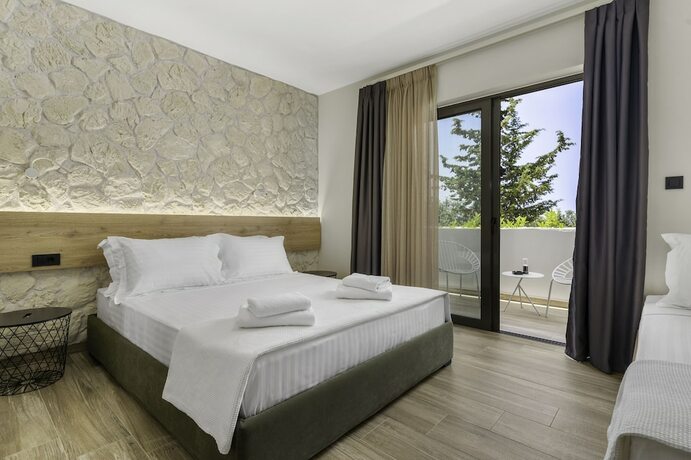 Imagen de la habitación del Hotel Sigma Luxury Rooms. Foto 17
