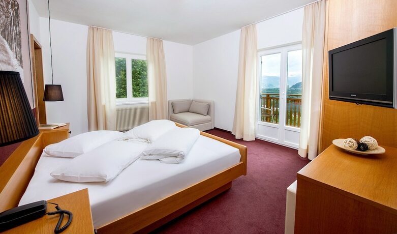 Imagen de la habitación del Hotel Sigmundskron. Foto 24