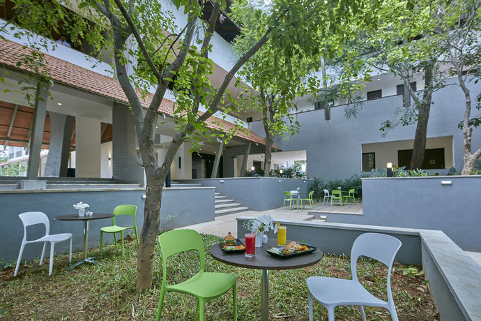 Imagen de la habitación del Hotel Signature Club Resort. Foto 8