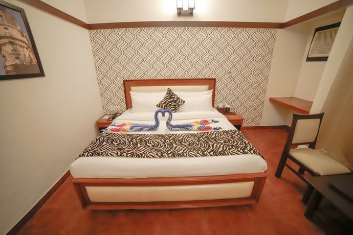 Imagen de la habitación del Hotel Signature Corbett. Foto 16