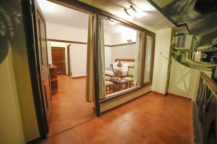 Imagen de la habitación del Hotel Signature Corbett. Foto 18