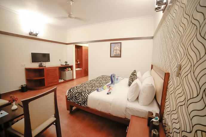 Imagen de la habitación del Hotel Signature Corbett. Foto 19