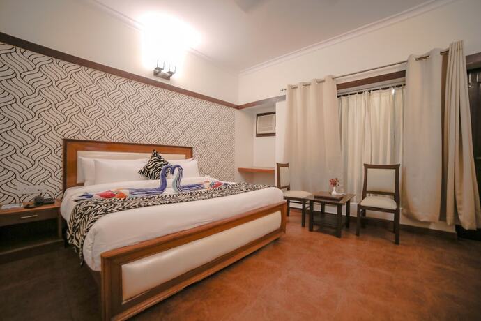 Imagen de la habitación del Hotel Signature Corbett. Foto 20