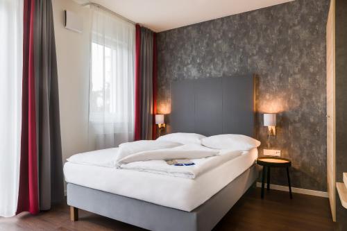 Imagen de la habitación del Hotel Signature East Apartment. Foto 6