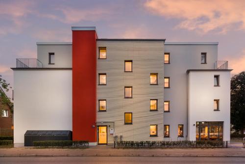 Imagen de la habitación del Hotel Signature East Apartment. Foto 7