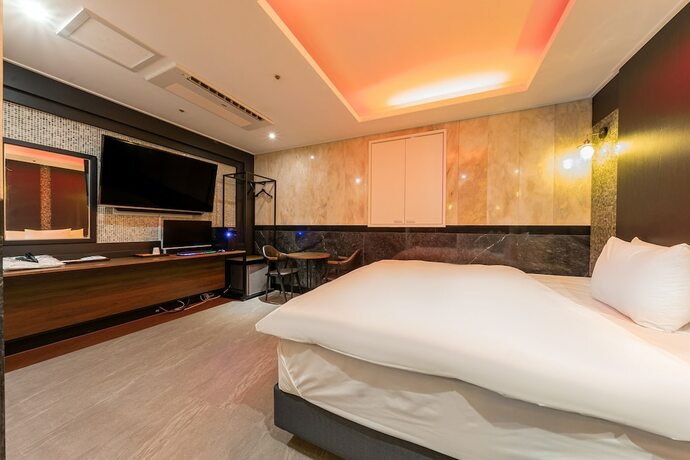 Imagen de la habitación del Hotel Signature. Foto 10