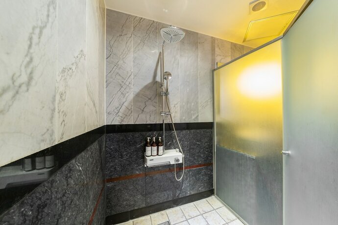 Imagen de la habitación del Hotel Signature. Foto 11