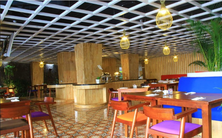 Imagen del bar/restaurante del Hotel Signature Hotel Bali. Foto 4