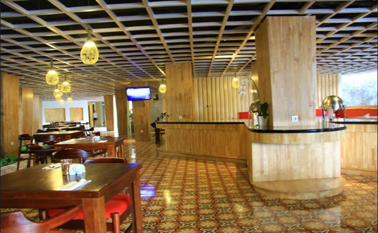 Imagen del bar/restaurante del Hotel Signature Hotel Bali. Foto 6