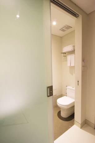 Imagen de la habitación del Hotel Signature Hotel Bali. Foto 11