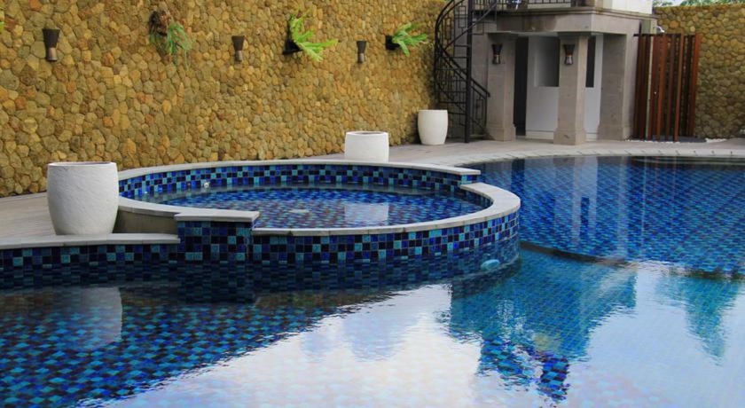Imagen de la piscina del Hotel Signature Hotel Bali. Foto 20