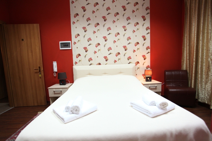 Imagen de la habitación del Hotel Signature Idea. Foto 6